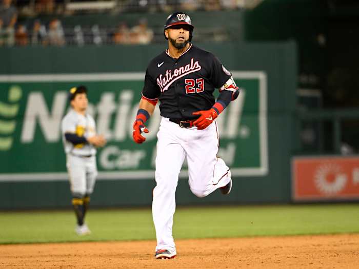 Nelson Cruz circles the bases after hitting a home run against the Milwaukee Brewers.